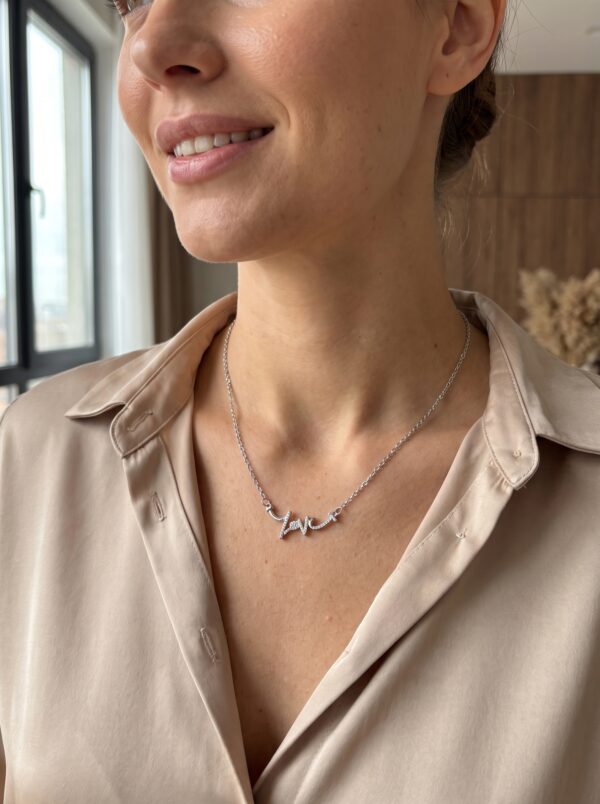 amour script silver necklace gal 2 Silver love script necklace on white background