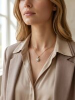 Elegant gold plated heart necklace on black velvet