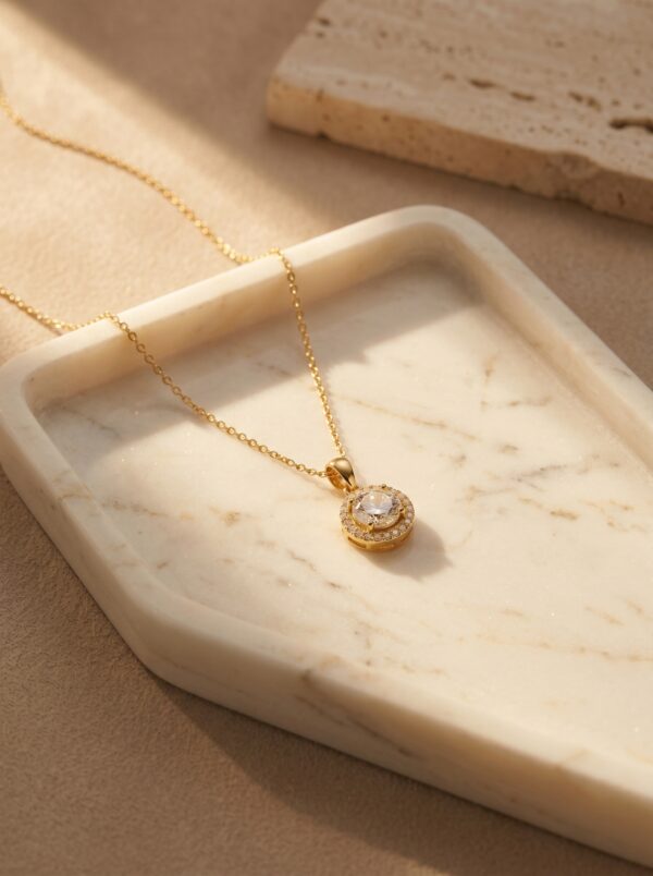 Elegant gold plated heart necklace on black velvet