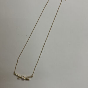 Model wearing delicate Aura Knot Golden Necklace