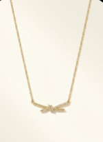 Close up of Aura Knot Golden Necklace pendant