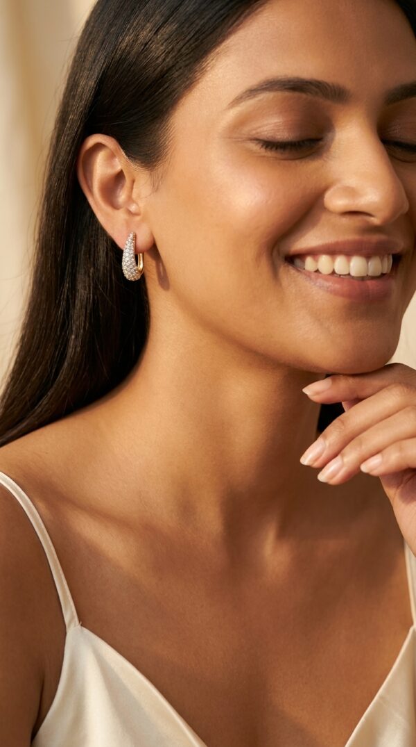 aura pav hoop earrings feat Woman wearing elegant gold Pavé Hoop Earrings