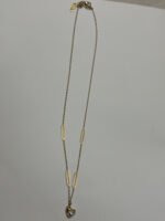 Close up of the Aura Pearl Heart Necklace inside a velvet box