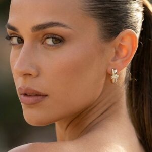 Model wearing Radiant Gold Hoop Earrings