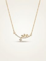 Minimalist gold plated necklace with delicate leaf and floral motif