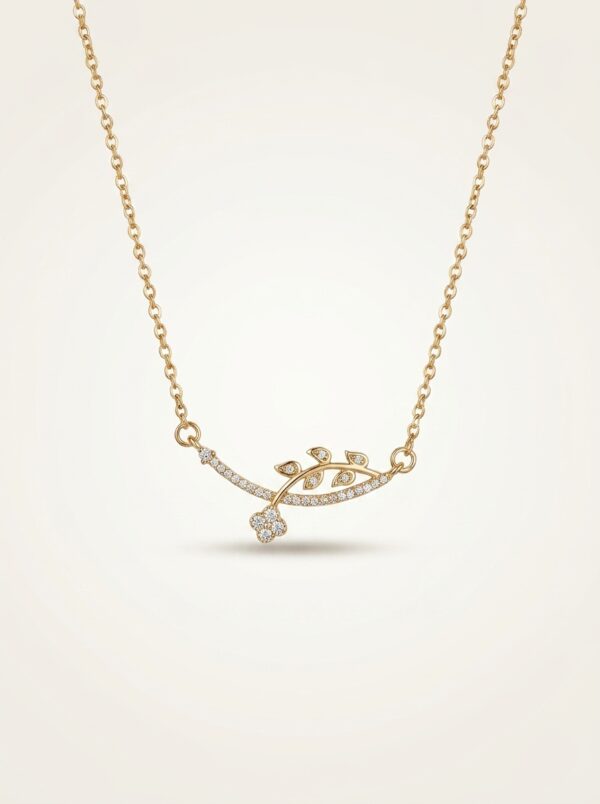 Minimalist gold plated necklace with delicate leaf and floral motif