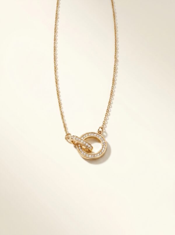 lifestyle shot of gold plated necklace on stone