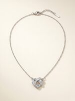 Close up view of the Intertwined Heart Necklace showing detail