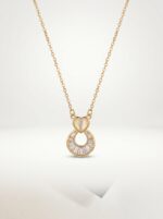 Close up of Lumina heart pendant necklace on velvet display
