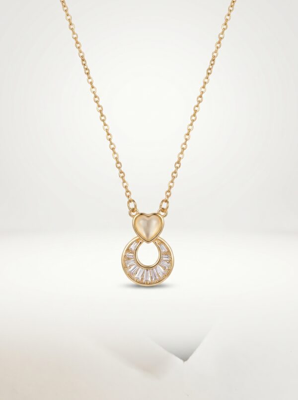 Close up of Lumina heart pendant necklace on velvet display