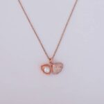 A woman wearing a beautiful Pearl Shell Pendant Necklace