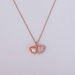 A woman wearing a beautiful Pearl Shell Pendant Necklace