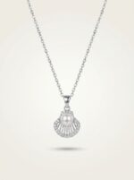 Isolated studio shot of the Pearl Shell Pendant Necklace against a neutral background