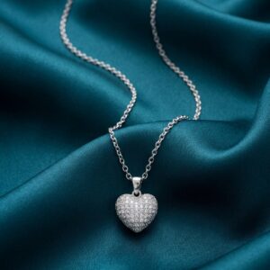 Starlight Paved Heart Necklace on teal silk