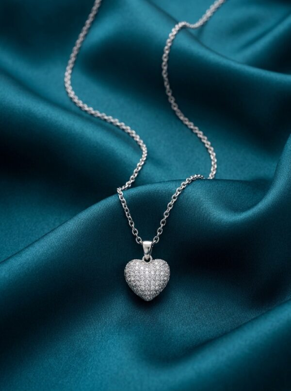 Starlight Paved Heart Necklace on teal silk