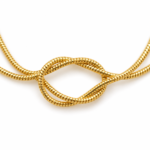 Close up of the intricate knot detailing on a gold plated bracelet