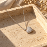 Crystal heart necklace on white background