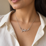 Model wearing the Amore Script Silver Necklace