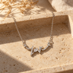 Amore Script Silver Necklace close up shot