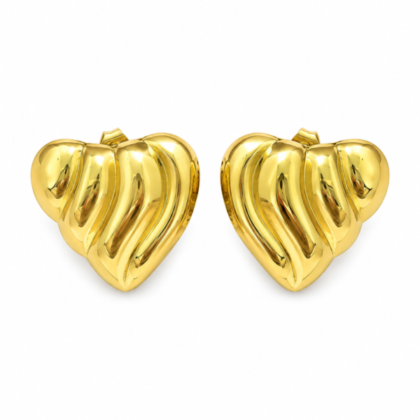 amorette gold heart earrings feat Pair of glossy gold heart earrings isolated on white