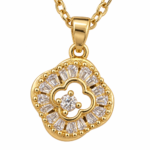 Detailed view of the intricate gold clover pendant with center diamond-like stone