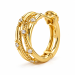 Close up of gold plated hoop earring showing intricate details