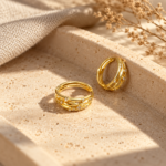 Pair of gold plated hoop earrings with crystal accents