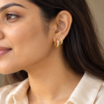 Woman wearing gold Aura Stone Hoop Earrings showcasing style