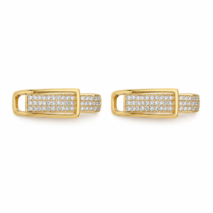 A pair of gold plated huggie hoops on white background