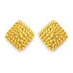 A pair of gold textured stud earrings on a plain white background