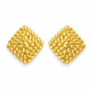 A pair of gold textured stud earrings on a plain white background