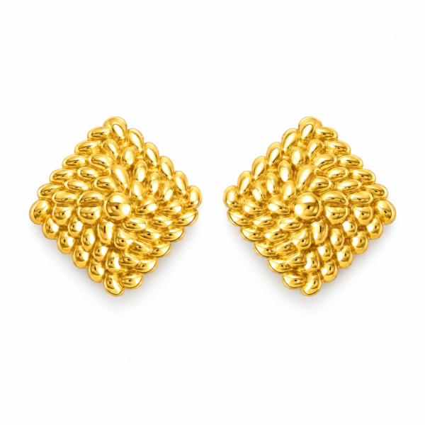 aurelia textured gold studs feat A pair of gold textured stud earrings on a plain white background