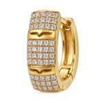 Close up of a single gold plated hoop earring with white stones