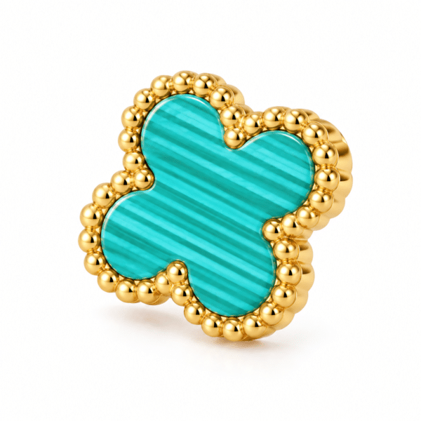 Close up of a single turquoise clover gold plated earring