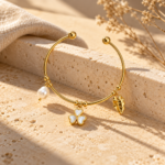 Flora Pearl Golden Kada on a clean white background