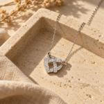 Close up of an Intertwined Heart Pendant with sparkling stones