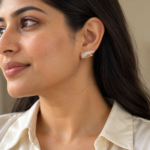 Model wearing elegant gold plated huggies