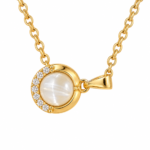 Close up of Lumina Pearl Gold Plated Necklace with celestial details
