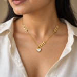 Woman wearing a dainty Pearlheart Golden Necklace