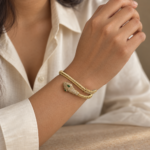 Elegant model wearing the Seraphina gold snake bracelet