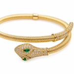 Close-up of the textured gold snake bracelet with shimmering stones