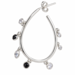 Close up of single drop style crystal hoop earring