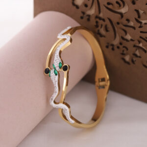 Ophira Golden Snake kada with saphire stpne eyes