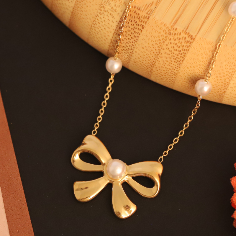 Pearl Bow Charm Necklace